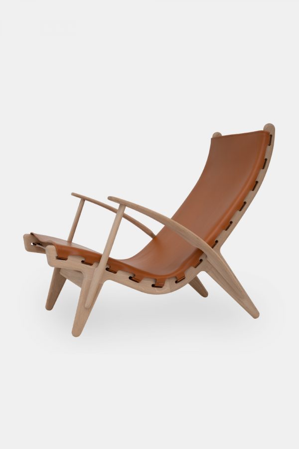 Loungechair med cognac farvet læder, designerstol